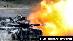 Ілюстраційне фото. Український танк Т-84 стріляє під час міжнародних навчань «Танковий виклик сильної Європи-2018». Німеччина, 8 червня 2018 року