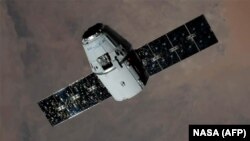 The first test flight of a SpaceX Dragon capsule
has been scheduled for April. (file photo)