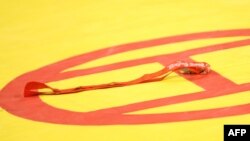 The discarded bronze medal of Swedish wrestler Ara Abrahamian after it was refused during the awards ceremony following the men's Greco-Roman 84 kg wrestling category during the 2008 Beijing Olympic Games.