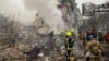 Ukrainian rescuers work at the site of a Russian missile strike on Poltava on February 1. 