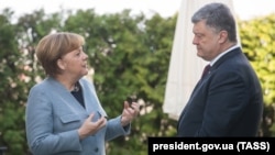 Анґела Меркель і Петро Порошенко під час зустрічі в Берліні, 10 квітня 2018 року