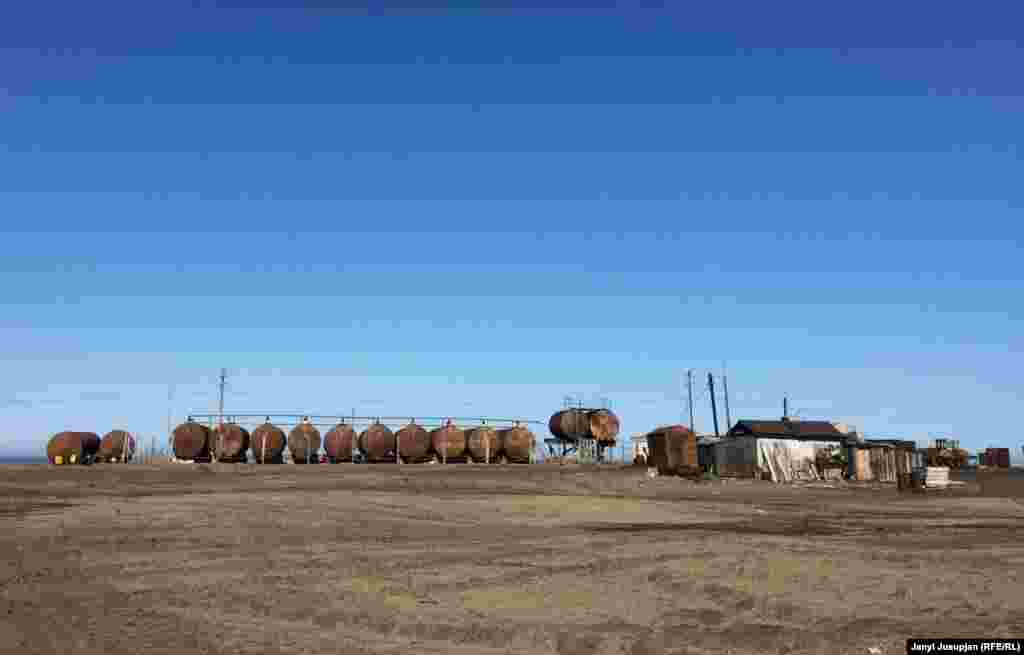 View of the rusting barrels, Billings village, Chukotka
