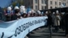 Protesters in St. Petersburg on May 1 demand fair elections.