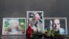 Flowers outside Moscow's Central House of Journalists in memory of three Russian journalists killed in the Central African Republic (Left to right: Aleksandr Rastorguyev, Kirill Radchenko, and Orkhan Dzhemal)