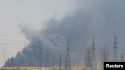 Smoke billows into the sky following a massive blaze at the Abqaiq oil-processing facility in Saudi Arabia on September 14.