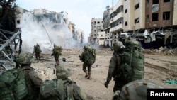 Militari israelieni în Fâșia Gaza. Fotografie pusă la dispoziție de armata israeliană pe 18 decembrie 2023.