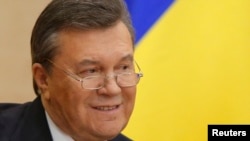 Украинанын кызматтан четтетилген президенти Виктор Янукович маалымат жыйыны маалында. Ростов-на-Дону шаары, Орусия Федерациясы. 28.2.2014.