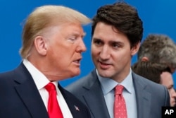 Predsednik SAD Donald Tramp i kanadski premijer Džastin Trudo 2019. godine.