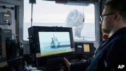 An Estonian naval ship patrols the Baltic Sea on January 9 following the suspected sabotage of undersea cables.