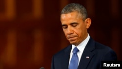 U.S. President Barack Obama pauses while speaking at an interfaith memorial service for the victims of the Boston Marathon bombing on April 18.