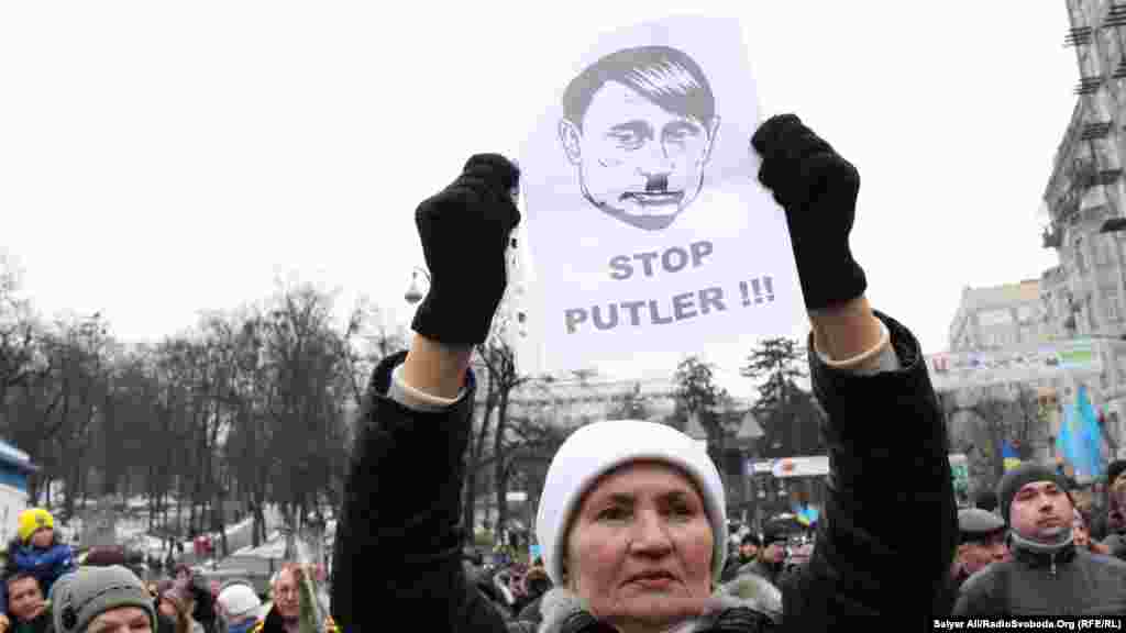 Участники "Марша достоинства" обвиняют в происходящем на Украине президента России Путина