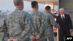 U.S. Defense Secretary Robert Gates meets with U.S. Air Force officials at Manas Air Base in Bishkek in December.