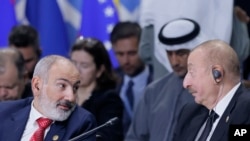 Russia - Armenian Prime Minister Nikol Pashinian and Azerbaijani President Ilham Aliyev attend Outreach/BRICS Plus format session at the BRICS Summit in Kazan, October 24, 2024. 