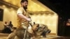 An ally who is speaker of Chechnya's parliament posted a photo of Ramzan Kadyrov with an angry dog straining on its leash and said its "fangs are itching" to get at opposition figures. 