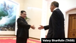 Russian Foreign Minister Sergei Lavrov (right) meets with North Korean leader Kim Jong Un in Pyongyang.