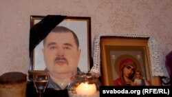 A photo of Henadz Kozyur, one of 14 workers who died in the October explosion at the plant, at his family home.