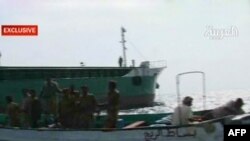 An Al Arabiya screen grab of an Iranian boat is seized by Yemeni coast gaurds in the Red Sea for allegedly carrying arms to Shi'ite rebels locked in fierce fighting with the army since August in the rugged mountains of northern Yemen.