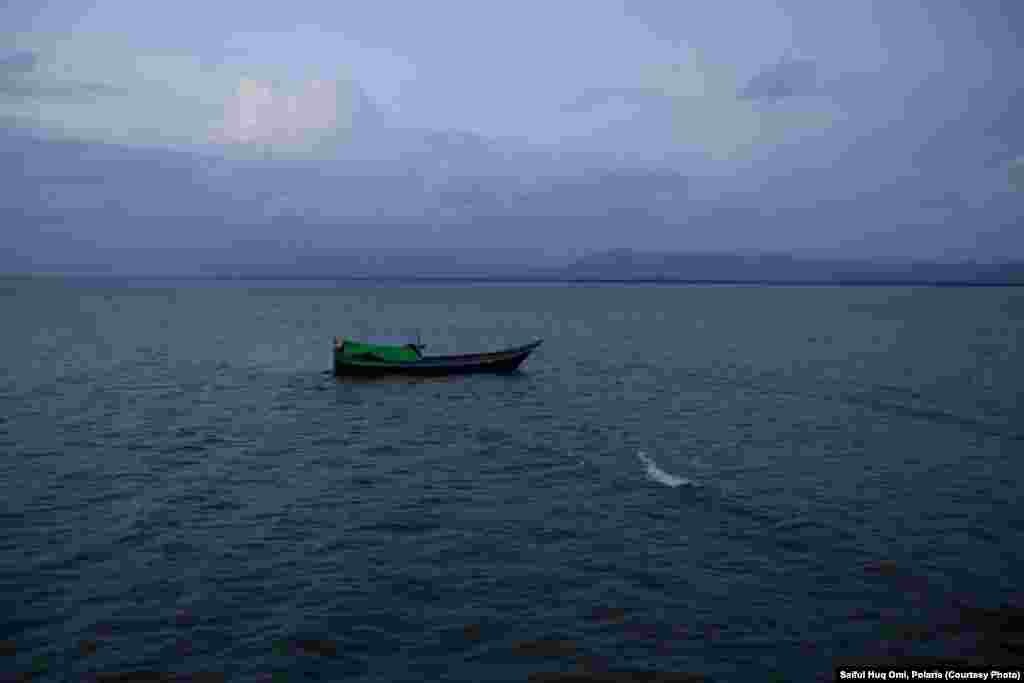 The Muslim Rohingya refugees from Burma attempt to get into neighboring Bangladesh by crossing the wide estuary of the Naf River, which marks the border between the two countries. 