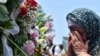 Bosnia and Herzegovina -- Citizens of Sarajevo in front of the Bosnian Presidency are paying their respect for the 19 Srebrenica genocide victims, who will be buried in Srebrenica on the July 11, in Sarajevo, July 9, 2021.
