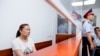 Chinese 'Reeducation Camps' Whistle-Blower Leaves Kazakhstan For Unnamed Country