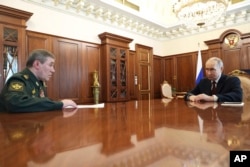 Валерий Герасимов и Владимир Путин
