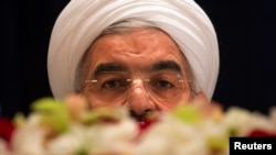 Iranian President Hassan Rohani takes questions from journalists at a news conference in New York in September.