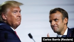 Președintele Franței, Emmanuel Macron (dreapta) este un promotor al autonomiei strategice a Europei. Declarații anti-NATO ale fostului președinte american, Donald Trump, îi susțin abordarea. (Fotografie din 2019)