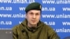 Adam Osmayev talks to reporters in Kyiv in January 2016.