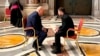 Ukrainian President Volodymyr Zelenskyy (right) and US President Donald Trump speak before the funeral of Pope Francis on April 26.