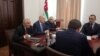 Слева направо: уходящий премьер Валерий Бганба, избранный президент Аслан Бжания и новый премьер-министр Александр Анкваб