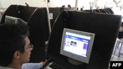 A young Iranian browses at an Internet cafe in the city of Hamadan (file photo)