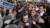 Armenia - Riot police clash with activists protesting against pension reform in Yerevan, 7Mar2014.