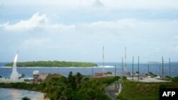 A Terminal High Altitude Area Defense (THAAD) interceptor is launched from Meck Island on its way to an intercept of a ballistic missile target during the U.S. Missile Defense Agency’s historic flight test in October 2012.