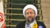 لاریجانی احمدی‌نژاد را از بازدید «بدون هماهنگی» از اوین منع کرد