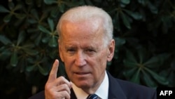 US Vice President Joe Biden says Russia has failed to stop sending weapons and militants across the border into Ukraine.