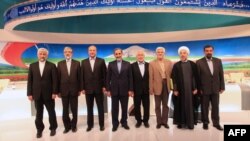 Iran's presidential candidates pose for a group photo after their live debate on state TV in Tehran on May 31.