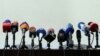 Armenia - TV and radio microphones set for a news conference in Yerevan.