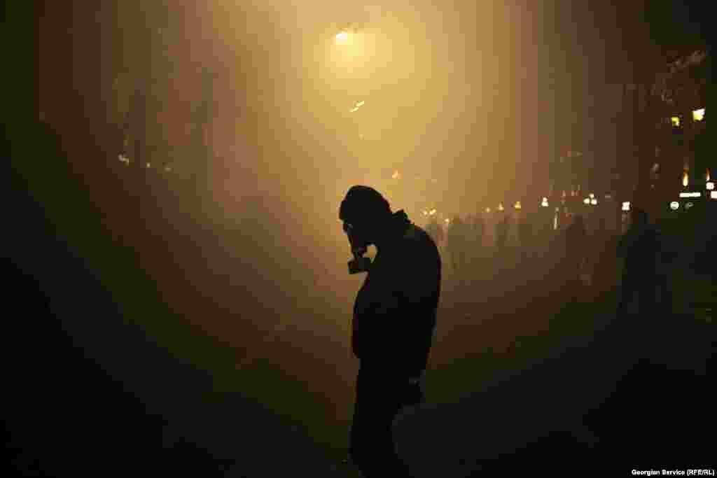 A protester wearing a gas mask amid heavy police use of tear gas on December 1. 