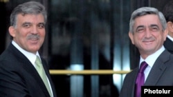 Turkish President Abdullah Gul (left) greets his Armenian counterpart, Serzh Sarkisian, in Bursa in October 2009.