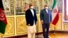 FILE: Afghan foreign minister Hanif Atmar with his Iranian counterpart Jawad Zarif in Tehran.