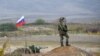 NAGORNO-KARABAKH -- A Russian peacekeeper patrols at the check point outside Askeran, November 20, 2020
