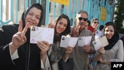 Iranians waiting to vote in Tehran on June 12.
