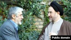 Mir Hossein Musavai (left) with with Mohammad Khatami
