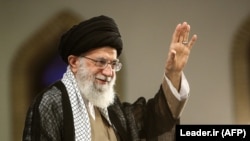 Iranian Supreme Leader Ayatollah Ali Khamenei gestures during a rally in Tehran on August 13.