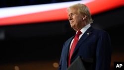 Candidatul republican la președinție, fostul președinte Donald Trump, la Convenția Națională Republicană. 15 iulie 2024.