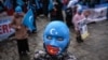 Протестувальники-уйгури, які втратили зв’язок зі своїми рідними на акції в Східному Туркестані (Китай), на акції протесту проти китайської політики, Стамбул, Туреччина, березень 2021 року