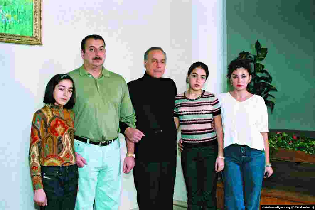 Heydar Aliyev (center) pictured with Ilham, Mehriban (right), and the couple's two daughters, Arzu (left) and Leyla.