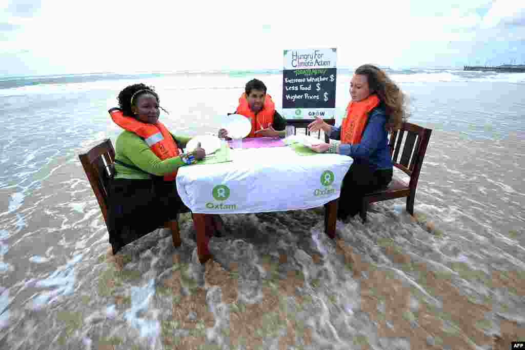 Južna Afrika - Brojnim akcijama u javnosti aktivisti ukazuju na problem klimatskih promjena, novembar 2011. Foto: AFP / Alexander Joe