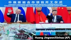 Pozdrav Vladimira Putina, predsednika Rusije i Si Đinping, predsednik Kine, tokom online razgovora o nuklearnim elektranama 19. maja 2021.