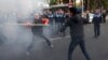 Armenia - Shant Harutiunian (L) clashes with another man during an anti-government demonstration in Yerevan, 5 November, 2013.